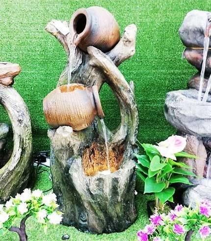 waterfall fountain with pot